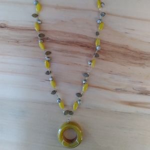 Handmade necklace with stone accent.